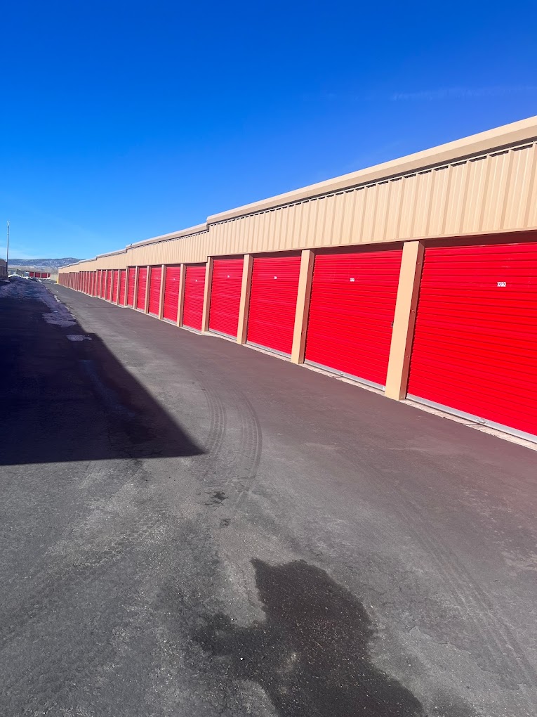 Exterior roll-up doors at Thunderbird Storage in Cedar City